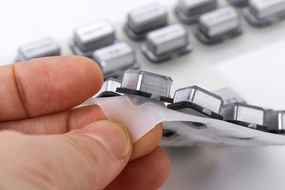 Plastic with Silicone keypad