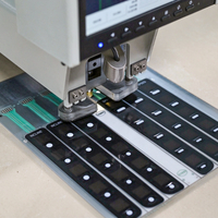Dome Placement:  Auto mount metal snap domes on circuit contact points.